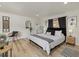 Bright bedroom with king-size bed and stylish decor at 2069 Bougainvillea St, Sarasota, FL 34239