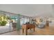 Game room with foosball table, access to pool, and comfortable seating at 2069 Bougainvillea St, Sarasota, FL 34239