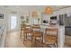 Modern kitchen with island seating and white cabinetry at 2069 Bougainvillea St, Sarasota, FL 34239