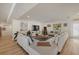 Spacious living area featuring a large sectional sofa and a flat-screen TV at 2069 Bougainvillea St, Sarasota, FL 34239