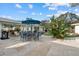 Backyard oasis with a kidney-shaped pool and patio at 2069 Bougainvillea St, Sarasota, FL 34239