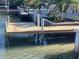 Private waterfront dock provides direct access to the ocean and features robust pylons for support at 2835 N Beach Rd, Englewood, FL 34223