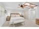 Bright bedroom with a king-size bed, and built-in closet at 3970 Prairie Dunes Dr, Sarasota, FL 34238