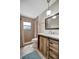Updated bathroom with a modern vanity and shower at 409 Archibald Ave, Sarasota, FL 34243