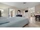Main bedroom with ensuite bathroom access at 409 Archibald Ave, Sarasota, FL 34243