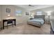 Bedroom with a queen bed and built-in desk at 409 Archibald Ave, Sarasota, FL 34243