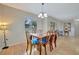 Classic dining room with hardwood floors and a formal dining set at 409 Archibald Ave, Sarasota, FL 34243