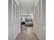 Hallway with closet access to bedrooms at 409 Archibald Ave, Sarasota, FL 34243