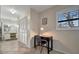 Small home office with built-in desk and chair at 409 Archibald Ave, Sarasota, FL 34243