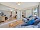 Sunroom with views into living room and backyard at 409 Archibald Ave, Sarasota, FL 34243