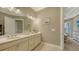 Double vanity bathroom with neutral tones and an ensuite layout at 4730 Zeno Ct, Bradenton, FL 34211