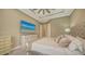 Main bedroom with king bed, dresser, and ensuite bathroom access at 4730 Zeno Ct, Bradenton, FL 34211