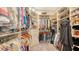 Large walk-in closet with ample shelving and hanging space at 4730 Zeno Ct, Bradenton, FL 34211