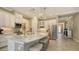 Large kitchen island with seating and updated stainless steel appliances at 4730 Zeno Ct, Bradenton, FL 34211