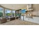 Granite countertops and stainless steel appliances feature in this outdoor kitchen at 4730 Zeno Ct, Bradenton, FL 34211