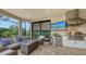 Relaxing patio with fire pit and wicker furniture at 4730 Zeno Ct, Bradenton, FL 34211