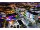 Aerial view of Rosemary District at night, showcasing the lively street scene and surrounding buildings at 800 N Tamiami Trl # 403, Sarasota, FL 34236