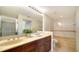 Double vanity bathroom with a soaking tub and shower at 800 N Tamiami Trl # 403, Sarasota, FL 34236