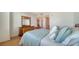 Bedroom features wood floors and plenty of light at 800 N Tamiami Trl # 403, Sarasota, FL 34236