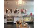 Interior of a cheese shop, showcasing an array of cheeses and gourmet food items at 800 N Tamiami Trl # 403, Sarasota, FL 34236