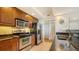 Kitchen boasts granite countertops and stainless steel appliances at 800 N Tamiami Trl # 403, Sarasota, FL 34236