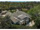 Luxury home with a large backyard and screened-in pool at 85 Sugar Mill Dr, Osprey, FL 34229
