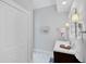 Simple bathroom with a vanity, a toilet, and a shower at 85 Sugar Mill Dr, Osprey, FL 34229