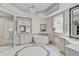 Elegant Primary bathroom with a freestanding tub and walk-in shower at 85 Sugar Mill Dr, Osprey, FL 34229