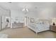 Bright bedroom with plush carpet and neutral color palette at 85 Sugar Mill Dr, Osprey, FL 34229