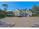 Attached two-car garage with paver driveway at 85 Sugar Mill Dr, Osprey, FL 34229