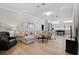 Open living space with light and airy feel, and hardwood floors at 85 Sugar Mill Dr, Osprey, FL 34229