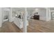 Open floor plan with hardwood floors, connecting to other rooms at 85 Sugar Mill Dr, Osprey, FL 34229