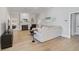 Spacious living room features a fireplace and hardwood floors at 85 Sugar Mill Dr, Osprey, FL 34229