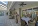 Spacious outdoor patio with wicker furniture, perfect for dining and relaxing at 85 Sugar Mill Dr, Osprey, FL 34229