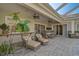 Relaxing patio area with comfortable lounge chairs and a view of the pool at 85 Sugar Mill Dr, Osprey, FL 34229