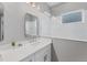 Clean bathroom with a single vanity and a shower/tub combo at 12735 Aquamarine Ave, Bradenton, FL 34211