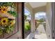 Welcoming entryway with charming wreath and view of landscaped walkway at 12735 Aquamarine Ave, Bradenton, FL 34211