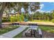 Playground with shaded areas and picnic table at 12735 Aquamarine Ave, Bradenton, FL 34211