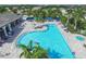 Community pool with a spa and plenty of lounge chairs at 12735 Aquamarine Ave, Bradenton, FL 34211