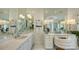 Elegant bathroom with dual vanities and large mirrors at 1430 Harbor Dr, Sarasota, FL 34239