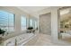 Stunning bathroom featuring a soaking tub and walk-in shower at 1430 Harbor Dr, Sarasota, FL 34239