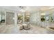 Luxurious Primary bathroom with marble floors, shower, and large walk-in closet at 1430 Harbor Dr, Sarasota, FL 34239