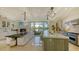 Spacious kitchen featuring a large island and stunning water views at 1430 Harbor Dr, Sarasota, FL 34239