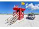 Beachfront lifeguard stand with beach patrol vehicle and surfboard at 1430 Harbor Dr, Sarasota, FL 34239