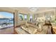 Luxurious main bedroom with water views and sitting area at 1430 Harbor Dr, Sarasota, FL 34239