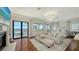 Spacious main bedroom with water views and sitting area at 1430 Harbor Dr, Sarasota, FL 34239