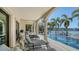 Relaxing patio with water views, comfortable seating, and tranquil ambiance at 1430 Harbor Dr, Sarasota, FL 34239