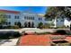 Historic school building with red brick walkway and benches at 1430 Harbor Dr, Sarasota, FL 34239