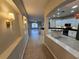 View of the kitchen and living area from the entryway at 19025 Fern Meadow Loop, Lutz, FL 33558