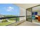 Balcony offering stunning water views and access to bedroom at 1932 Harbourside Dr # 232, Longboat Key, FL 34228